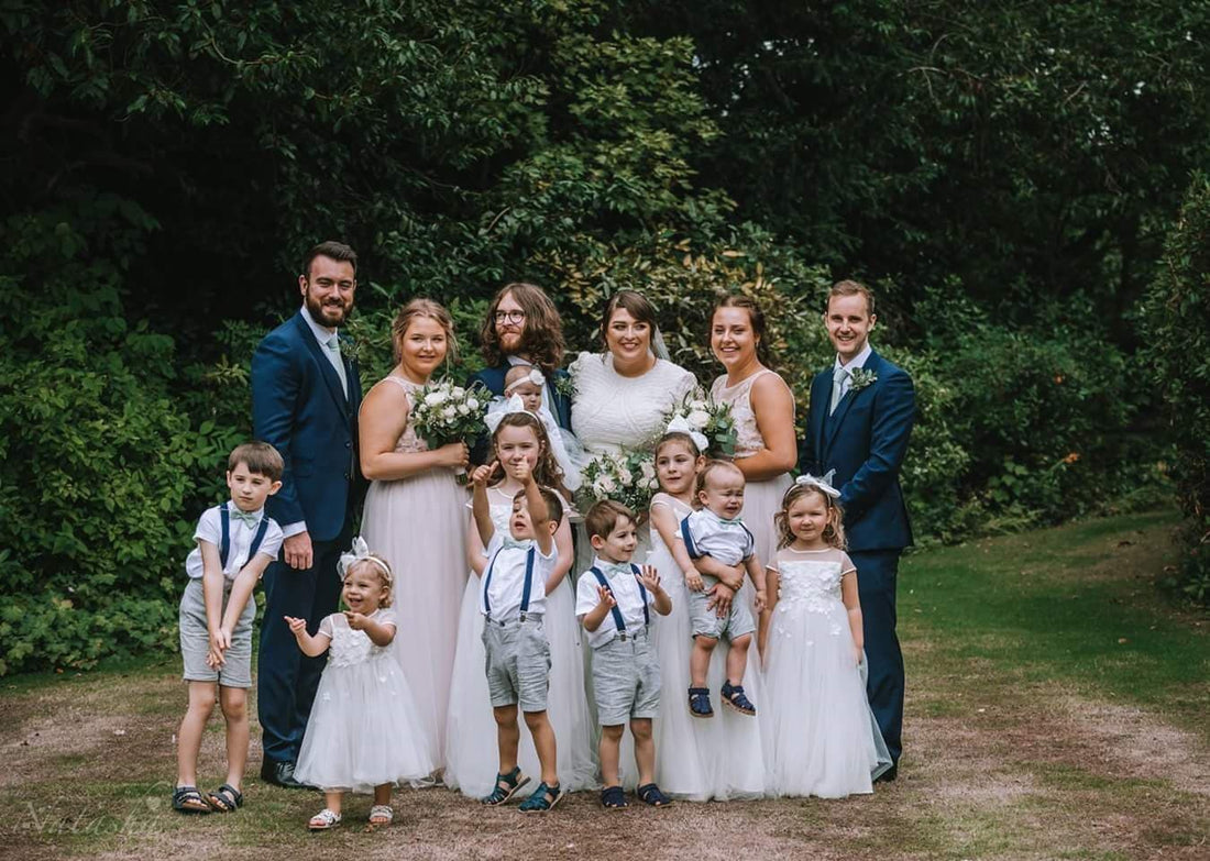 Sage Wedding Photo - Group Photo against emerald green foliage background