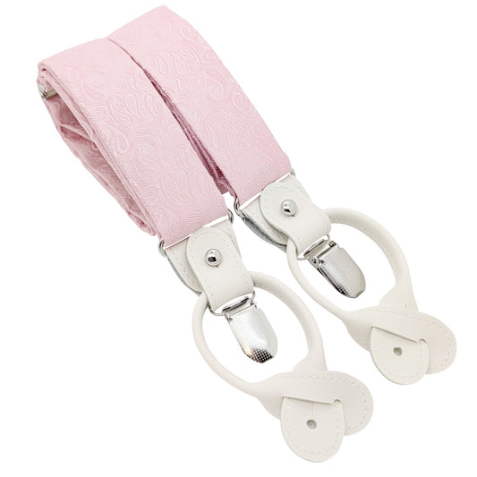 Light pink patterned fabric suspenders with metal clips and silver metal rivets, shown on a plain white background.